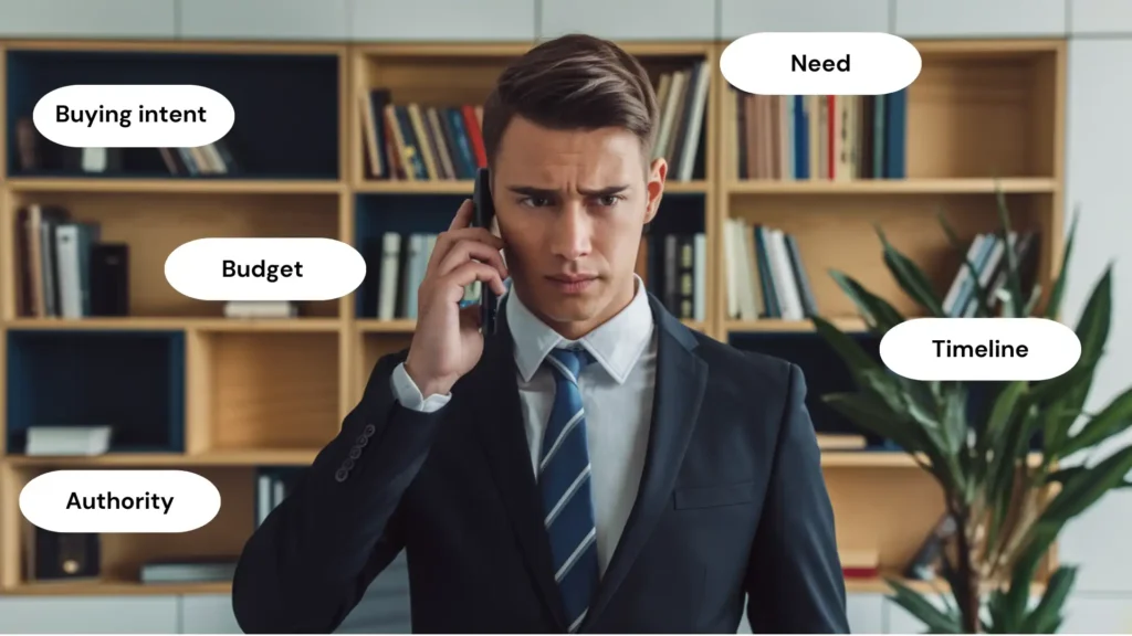 A professional-looking man in business attire standing confidently in a modern office setting, representing high-value prospects